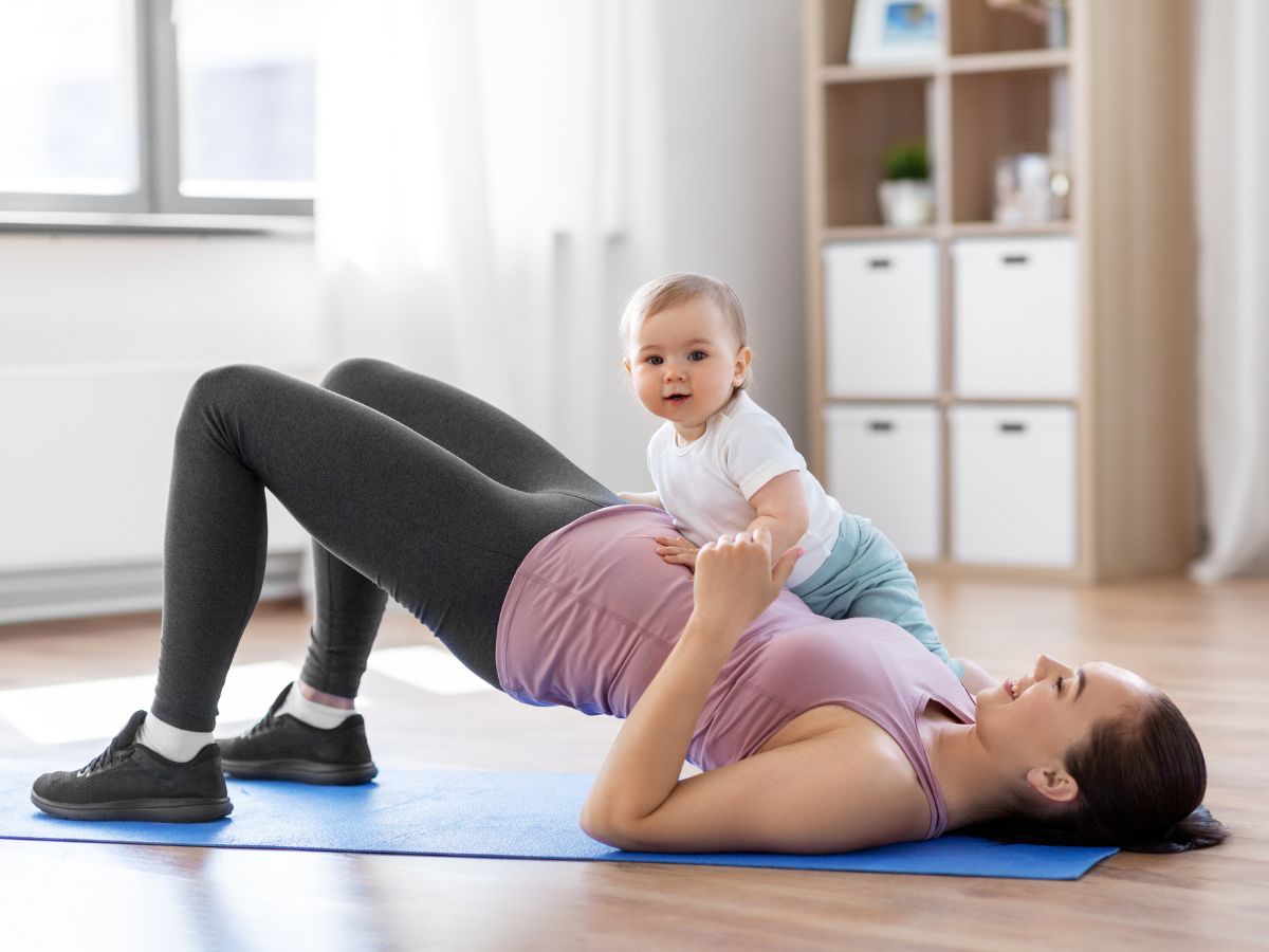 Mom working out with her baby.